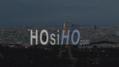 Paris And Its Main Monuments At Night, Under The Full Moon, Aerial Images From A Helicopter