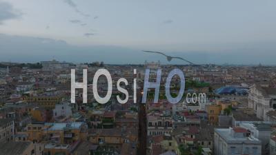 Aerial View Of Buildings In Urban Borough At Dusk. Classic Apartment Buildings With Rooftop Terraces. Rome, Italy - Video Drone Footage