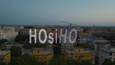 Forwards Fly Above Buildings In Urban Borough. Apartment Buildings In Housing Estate In Large City At Twilight. Rome, Italy - Video Drone Footage