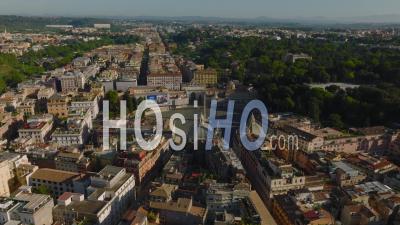 Fly Above Historic City Centre. Old Multistorey Buildings With Rooftop Terraces, Oval Square Piazza Del Popolo With Egyptian Obelisk. Rome, Italy - Video Drone Footage