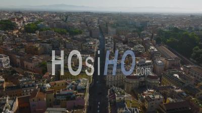 Aerial Panoramic Footage Of Historic Urban Borough. Forwards Fly Above Street And Tilt Down On Piazza Barberini With Fontana Del Tritone. Rome, Italy - Video Drone Footage