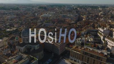Aerial Panoramic View Of Historic Buildings And Tourist Sights Lit By Bright Morning Sun. Forwards Fly Above City Centre. Rome, Italy - Video Drone Footage