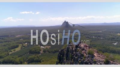 An Aerial View Shows The Glass House Mountains In Queensland, Australia - Video Drone Footage
