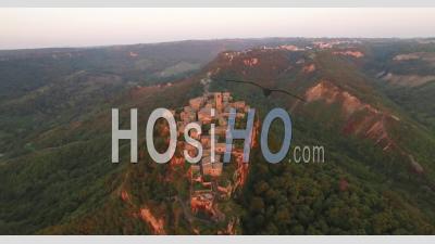 An Aerial View Shows Civita Di Bagnoregio, Italy At Sunset - Video Drone Footage