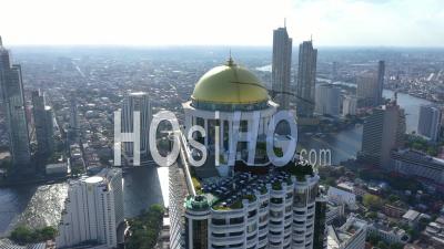 The Sky Bar Is Seen Sitting Atop The State Tower In Bangkok, Thailand - Video Drone Footage