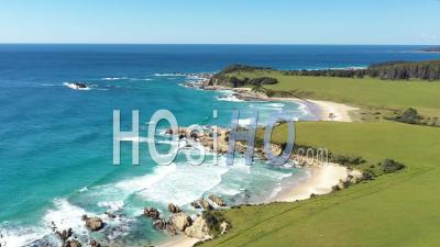 2020 - An Excellent Aerial Shot Of Waves Lapping The Shores Of Narooma Beach In New South Wales, Australia - Video Drone Footage