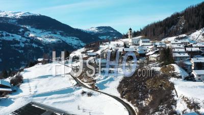 2022 - Excellent Aerial View Of The Snow-Covered Mountain Town Of Alvaneu, Switzerland - Video Drone Footage
