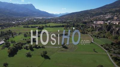 The Plain Under The Roc D'embrun Hautes-Alpes, France, Viewed From Drone