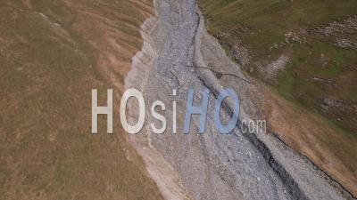 Bed Of A Dry Mountain Torrent (summer Drought) In Summer, Hautes-Alpes, France, Viewed From Drone
