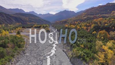 Boscodon Forest In Autumn, Torrent Of Boscodon, Crots, Hautes-Alpes, France - Drone Point Of View