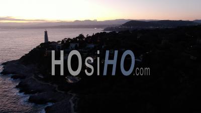 Lighthouse Of Saint-Jean-Cap-Ferrat And Bay Of Nice At Dusk, Drone Aerial Footage