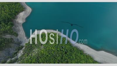 The Serre-Poncon Lake At Pontis Towards Sauze-Du-Lac, Hautes-Alpes, France - Video Drone Footage