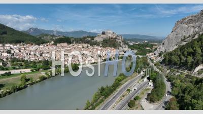 Sisteron On The Banks Of The Durance, A Stopover Town On The Route Napoleon And The Rocher De La Baume, Alpes-De-Haute-Provence, France - Video Drone Footage