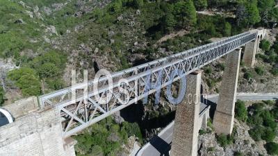 Eiffel Viaduct Bridge Over The Vecchio River, Corsica, France - Video Drone Footage