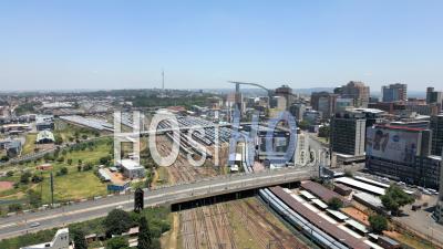 Braamfontein Train Yard With Traffic Queen Elizabeth Bridge And Nelson Mandela Bridge, Johannesburg, South Africa - Video Drone Footage