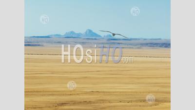 Desert Landscape With The Spitzkoppe Mountains In The Background, Khomas, Namibia - Aerial Photography
