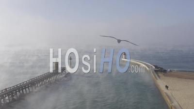 Drone View Of Capbreton In The Mist, The Lighthouses With Ocean Evaporation