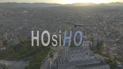 Basilica Of Notre-Dame-De-La-Garde At Sunrise, Marseille, Bouches-Du-Rhone, France - Video Drone Footage