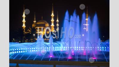 Colored Fountain And The Blue Mosque In Istanbul At Night