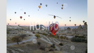 Hot Air Ballons Flying On The Sky Of Mysterious Cappadocia Turkey