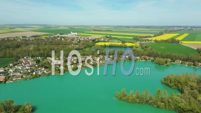 Colorful Lakes And Fields In Agricultural Plains In Spring, France, Drone Point Of View