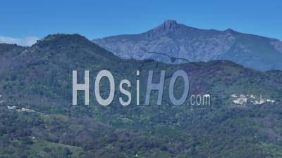 Mountain Range From Folleli Beach, Corsica Island, France - Video Drone Footage