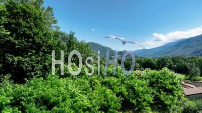 Aerial View Of Equestrian Center In Nature Near Vizille In The French Alps In Aerial View - Video Drone Footage