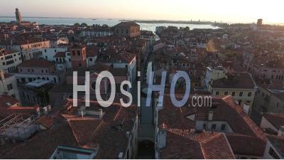 Flyover A Narrow Canal In Venice - Video Drone Footage