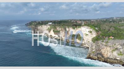 Seashore And Cliffs Nearby Pura Uluwatu Temple, Bali, Indonesia - Video Drone Footage