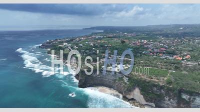 Seashore And Cliffs Nearby Pura Uluwatu Temple, Bali, Indonesia - Video Drone Footage