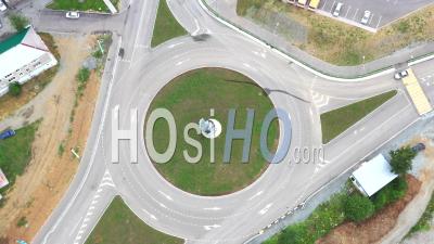 Roundabout Traffic On The Central Square Of The City Of Kachkanar - Video Drone Footage