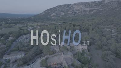 Taillades Village And Amphitheater At Dusk, France - Video Drone Footage